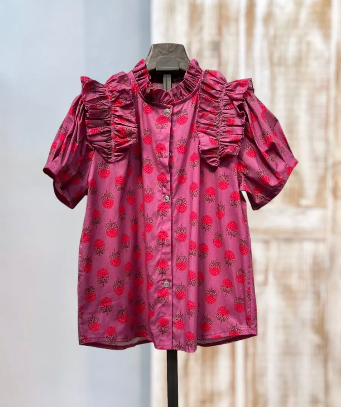 Camisa rosa estampada volantes