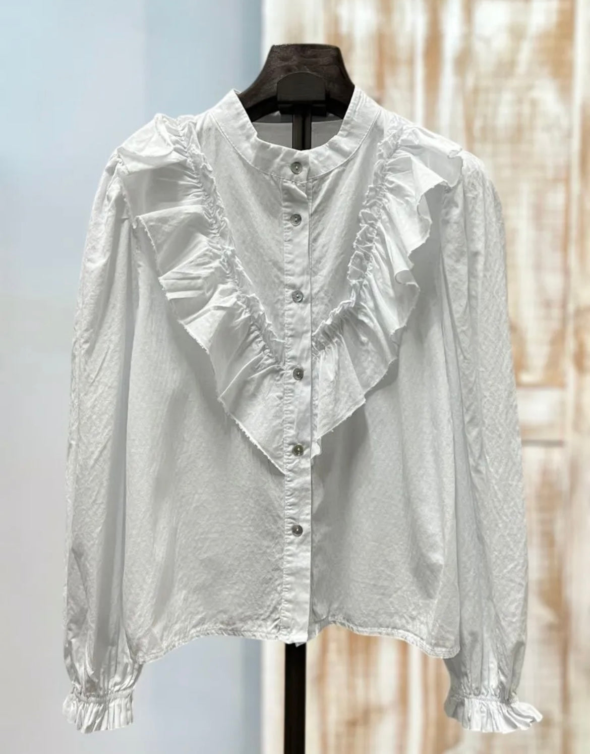 Camisa blanca volante