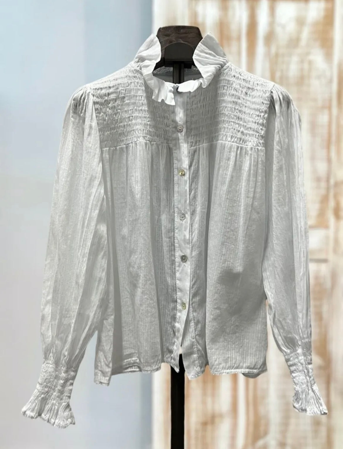 Blusa blanca volante