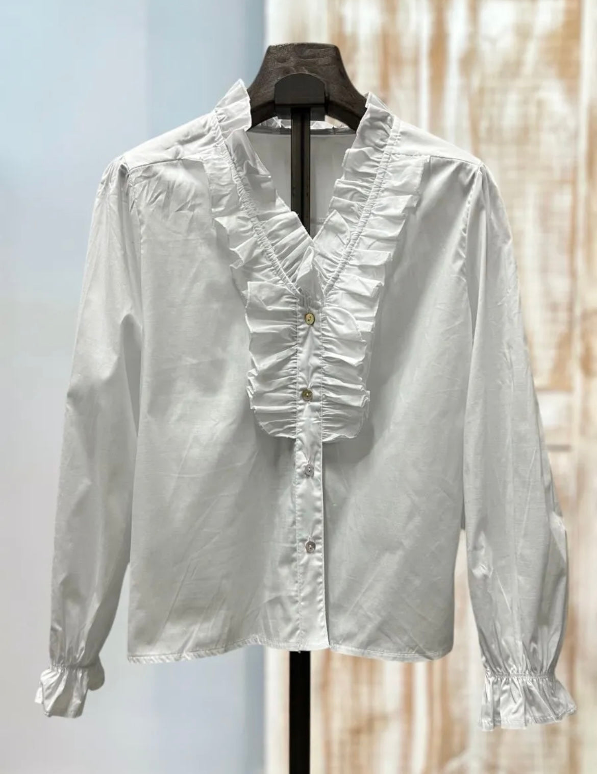 Camisa blanca volante