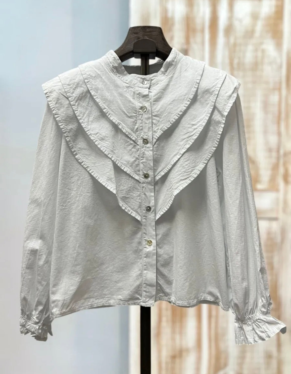 Camisa blanca volantes