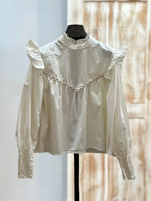Camisa volantes color crema