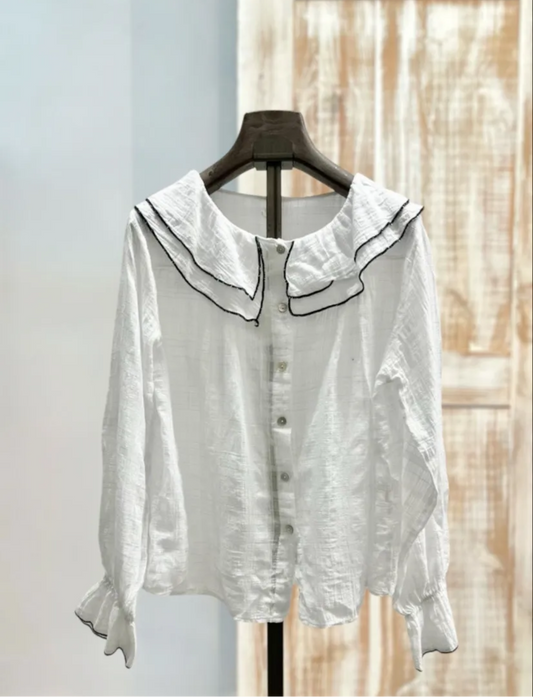 Blusa blanca cuello volante