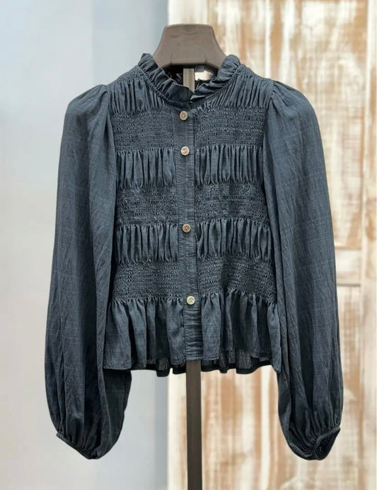 Blusa gris fruncida