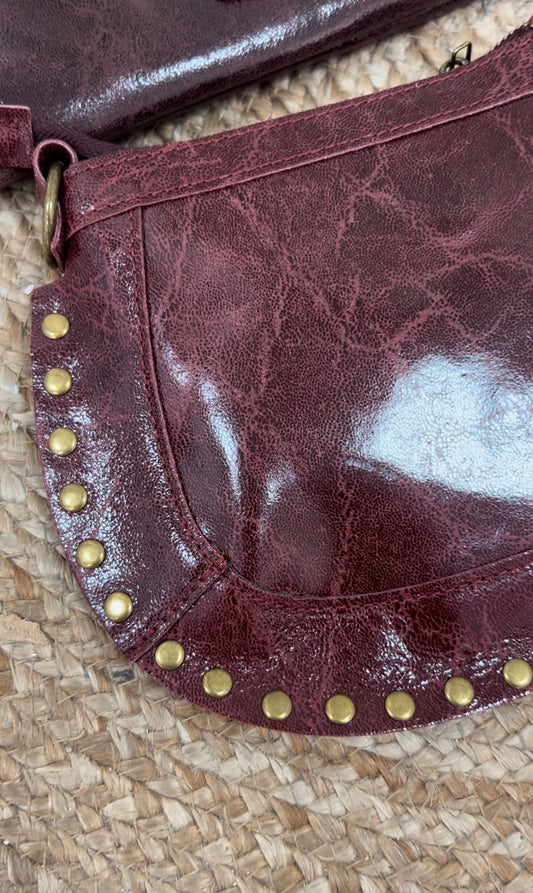 Bolso redondo tachuelas