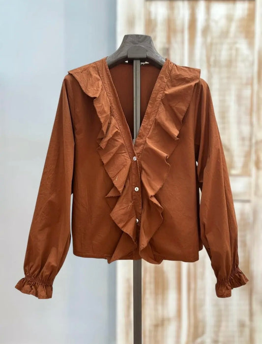 Blusa detalle volante