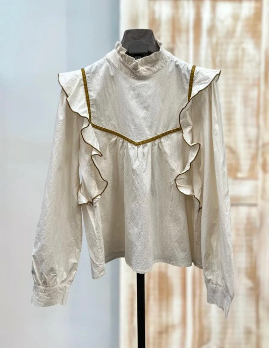 Blusa color crema detalle terciopelo