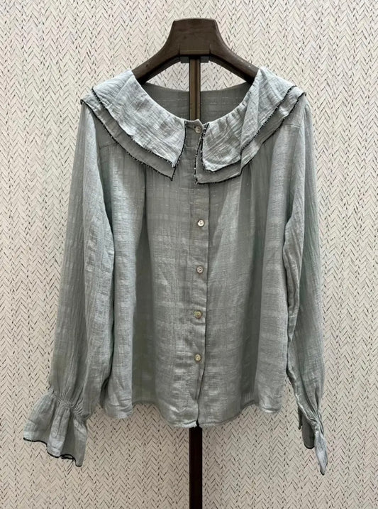 Blusa gris volante