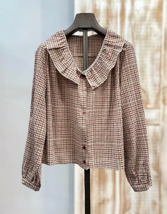 Blusa cuadros volante